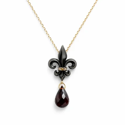 Fleur de lis motifli garnet taşlı pırlanta detaylı kolye